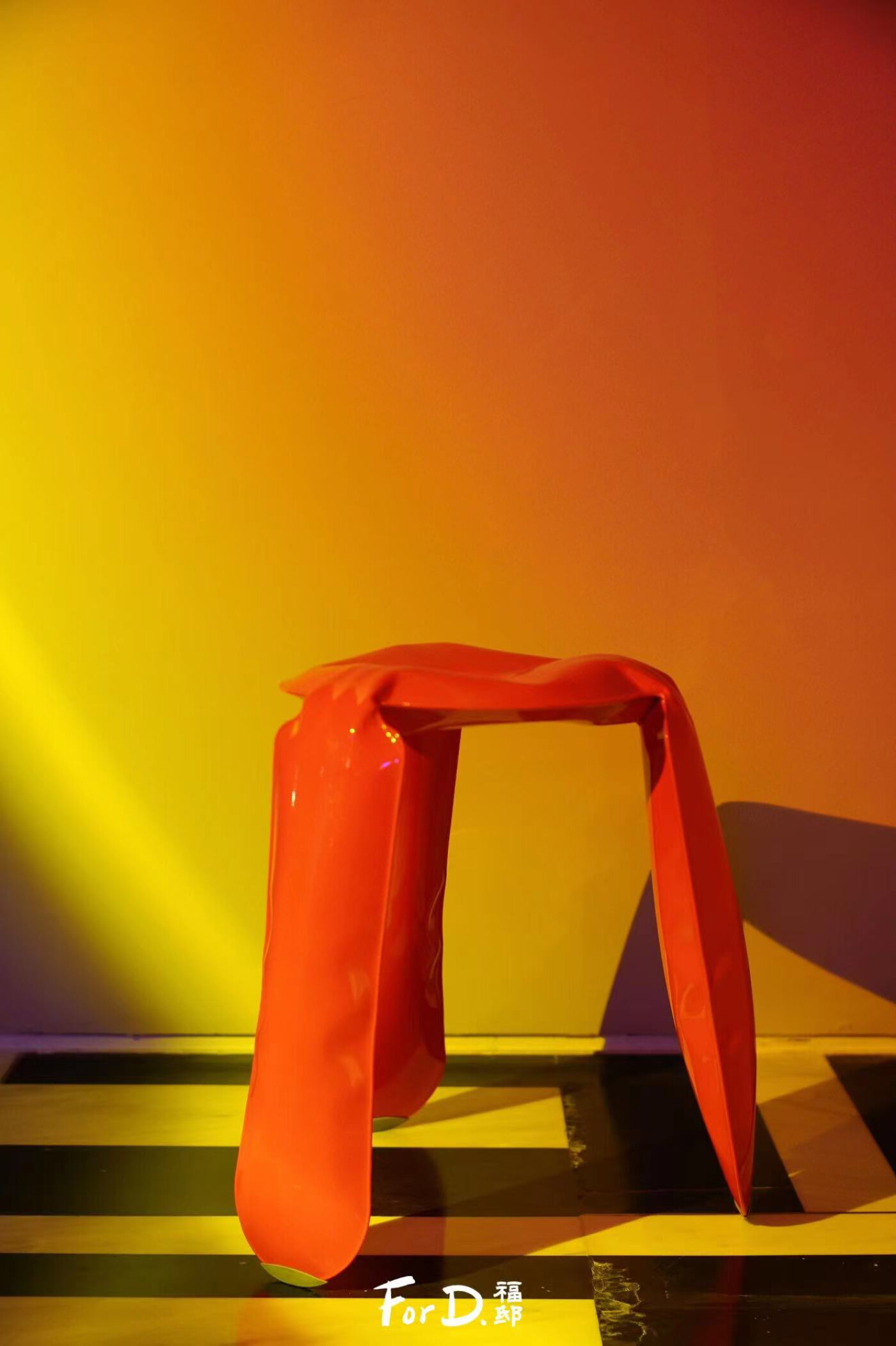 plopp stool in orange neon finish