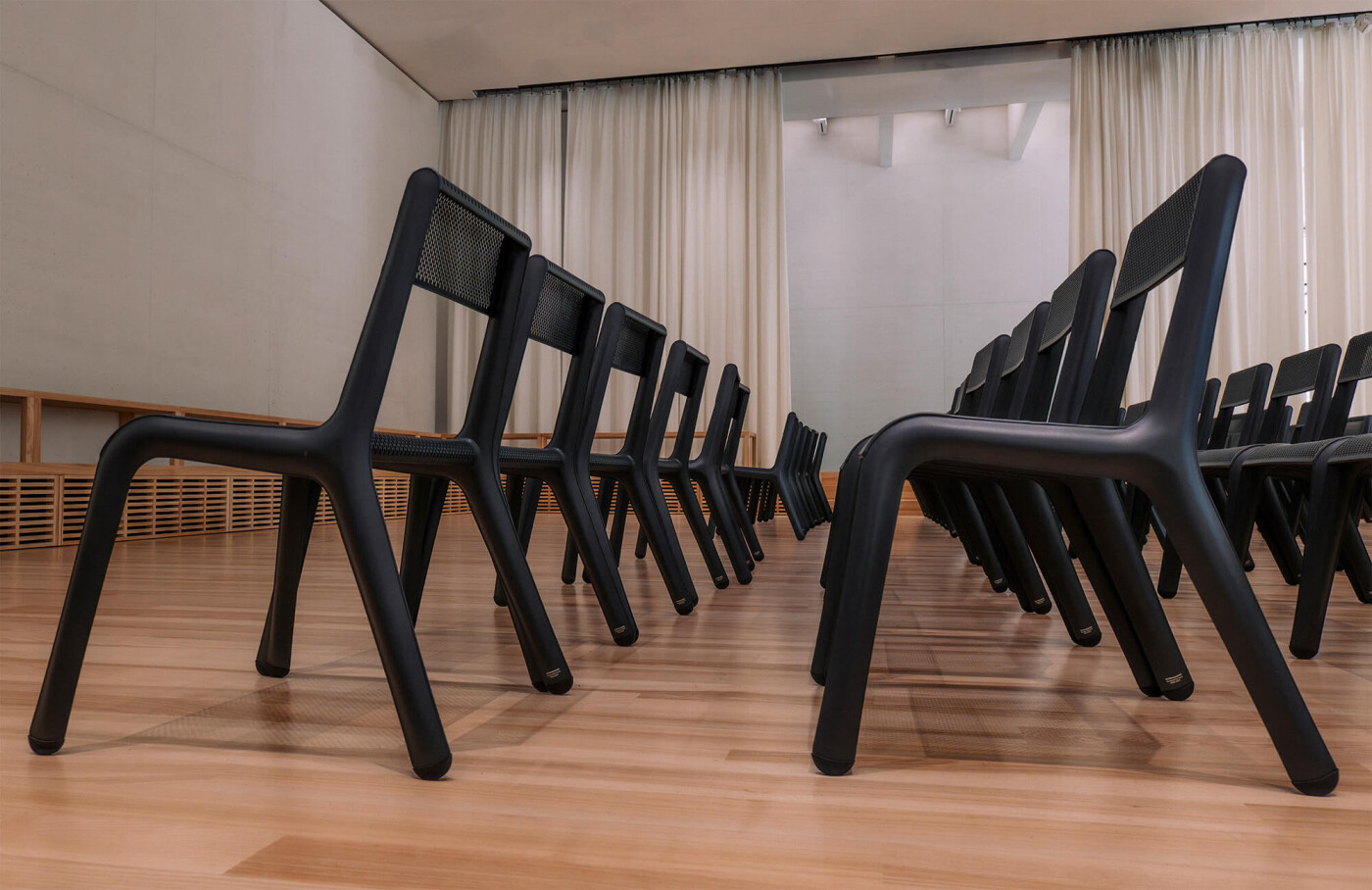Zieta Ultraleggera chairs Anodic Black Aluminium standing in rows