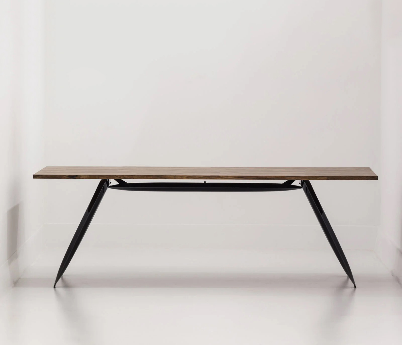 a minimalistic elegant steel table designed by zieta studio