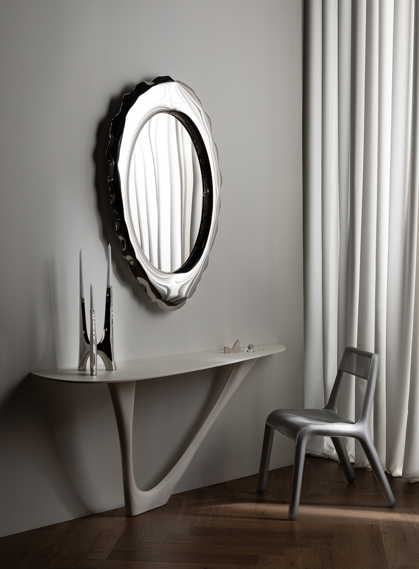 Zieta Inflated steel mirror Silex steel lightest chair Ultraleggera steel candleholder Triglav beige table G-console steel base and top