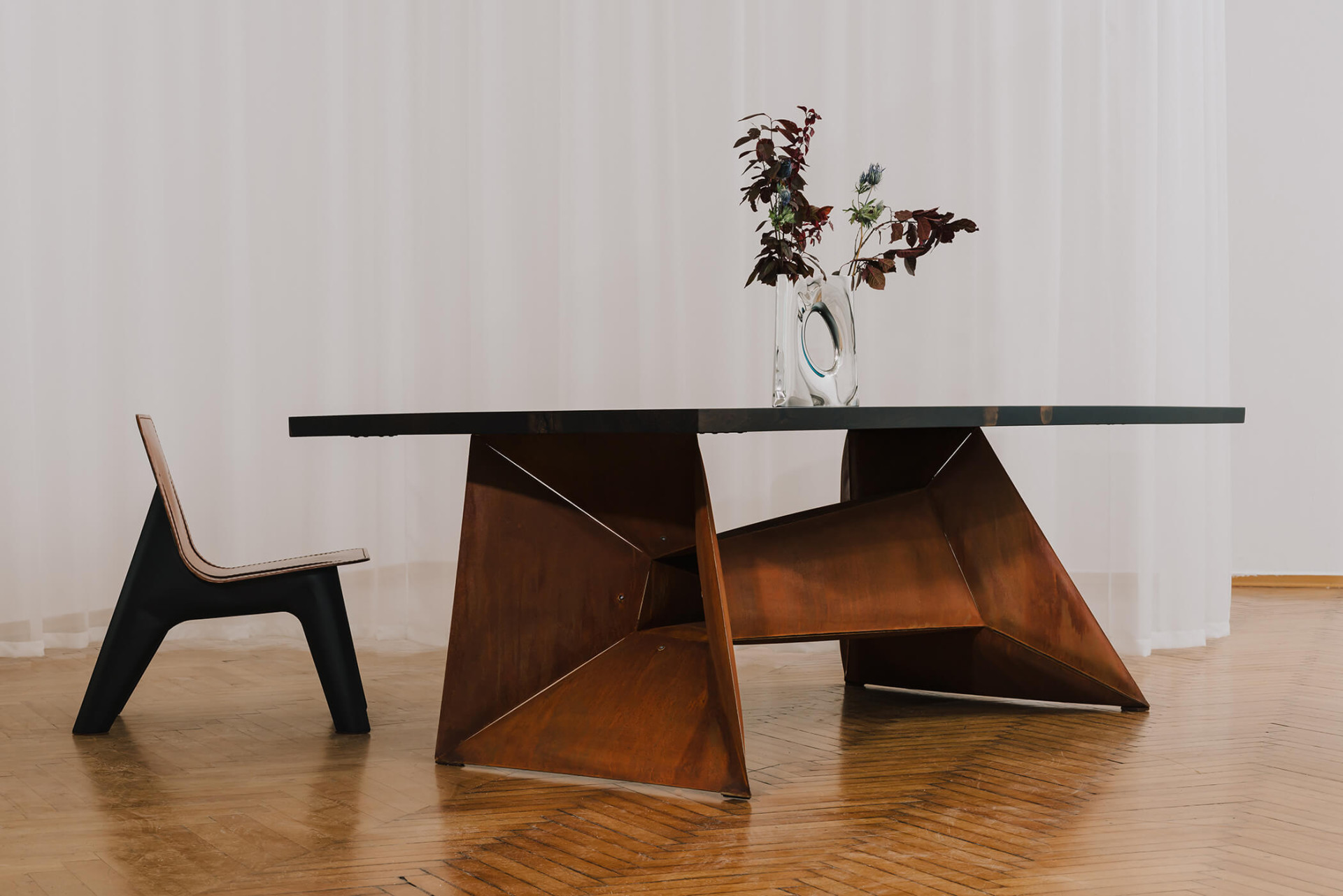 steel table chair and vase by zieta studio